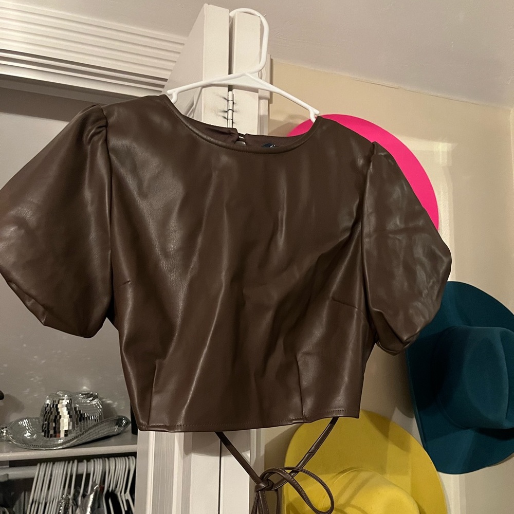 Brown leather puff sleeve top
size: large- fits smaller